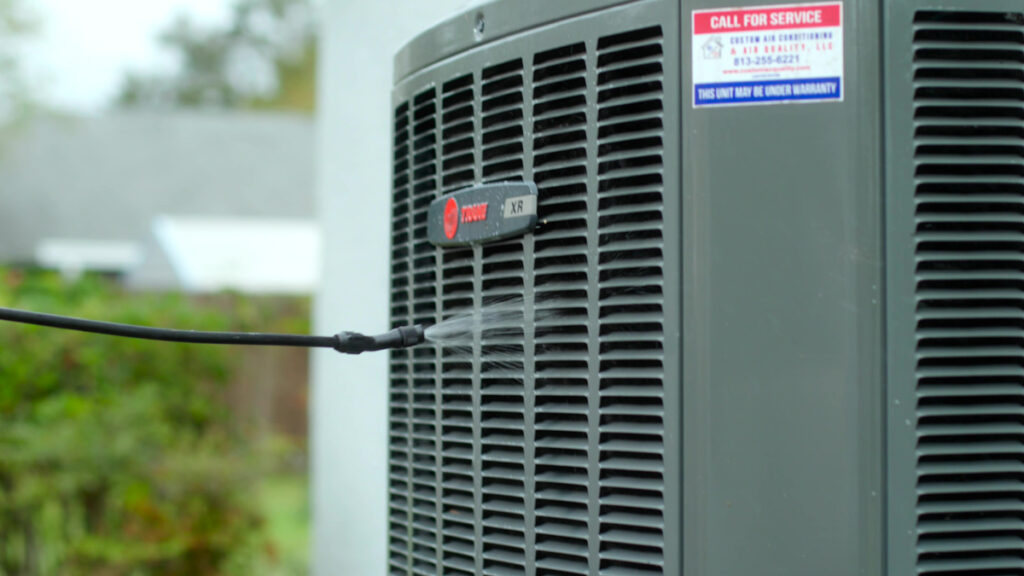 Air Conditioner Maintenance and Service 2 Custom air conditioning and air quality technician cleaning hvac