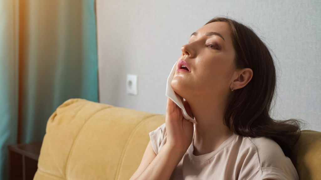 a woman sweating during a hot tampa summer 1024x576 1