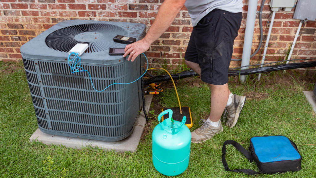 AC Repair in New Port Richey, FL 4 an-ac-technician-charging-an-ac-units-refrigerant