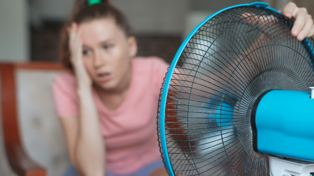 a woman in need of emergency hvac services in pasco county